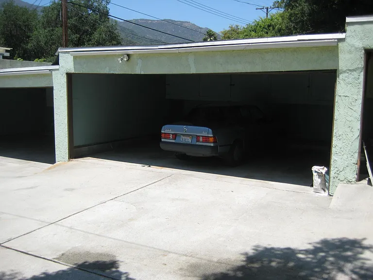 Extra Large 2-car carport with storage lockers