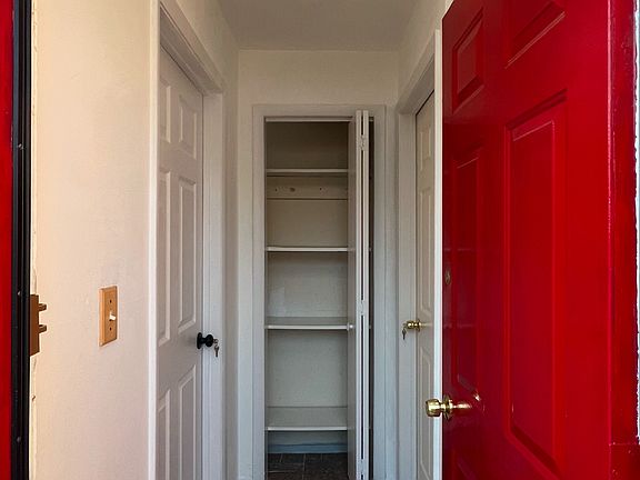 Front hallway with small closet