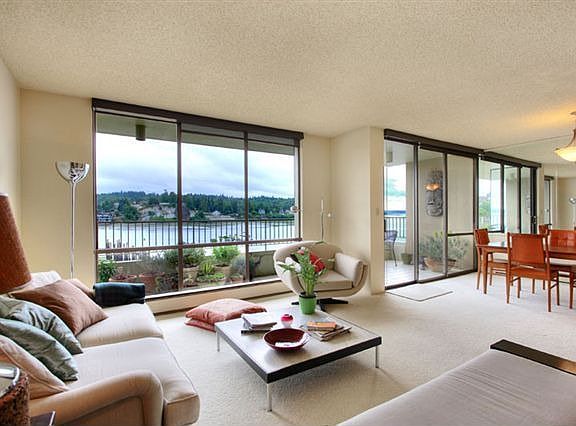 Open Living room and Dining room perfect for entertaining and large view deck just off Dining room