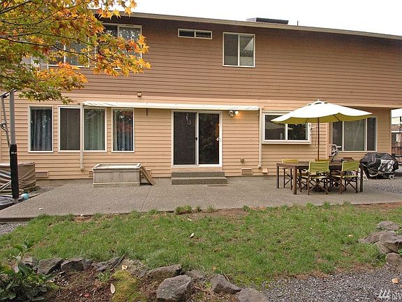 Enough room for the basketball hoop.  The trampoline off the the right......Room for all of your toys and entertaining.