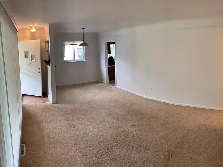 Front Entrance, Living Room and Dinning Area