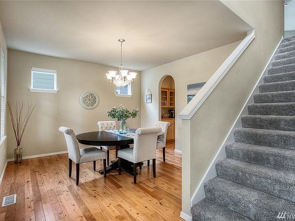 Just off the welcoming vaulted foyer is the spacious formal dining room. 