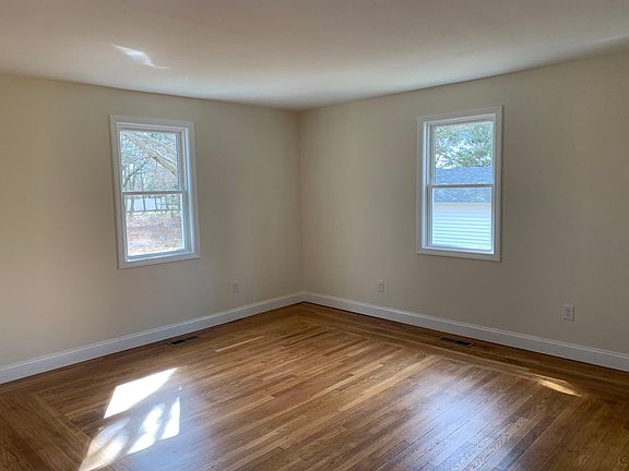 Bedroom with plenty of natural light. Hardwood Floors