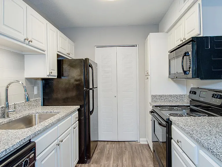 GRANITE COUNTERTOPS IN ALL-ELECTRIC KITCHEN