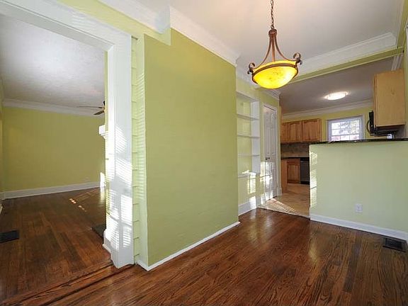 Dining separated by kitchen bar