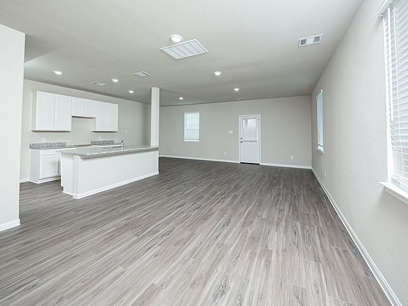 Family Room to Dining Area and Kitchen