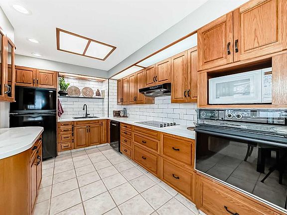 2nd image of 8043 N Elbow Dr SW