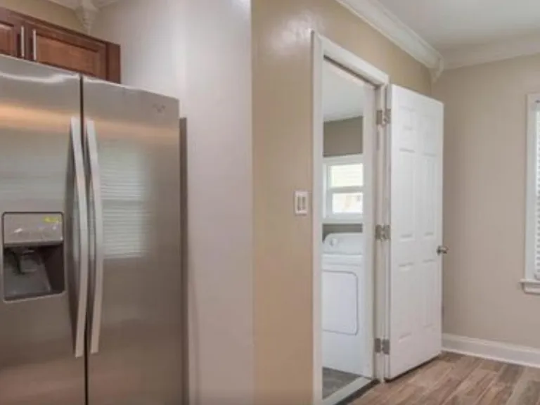 Laundry room and back yard/porch access in kitchen