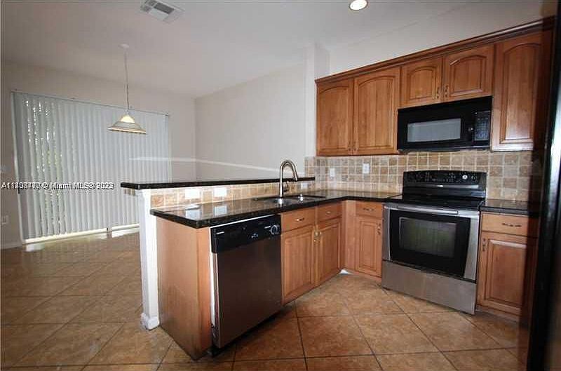 1st image of 21221 NW 14th Pl APT 423