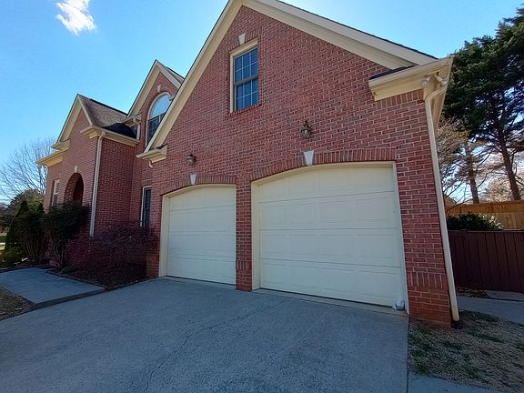 Driveway and garages (three car garage)