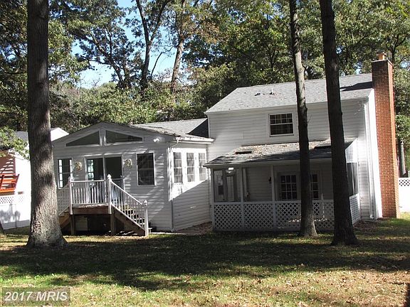 Exterior (Rear)Note addition and screened porch