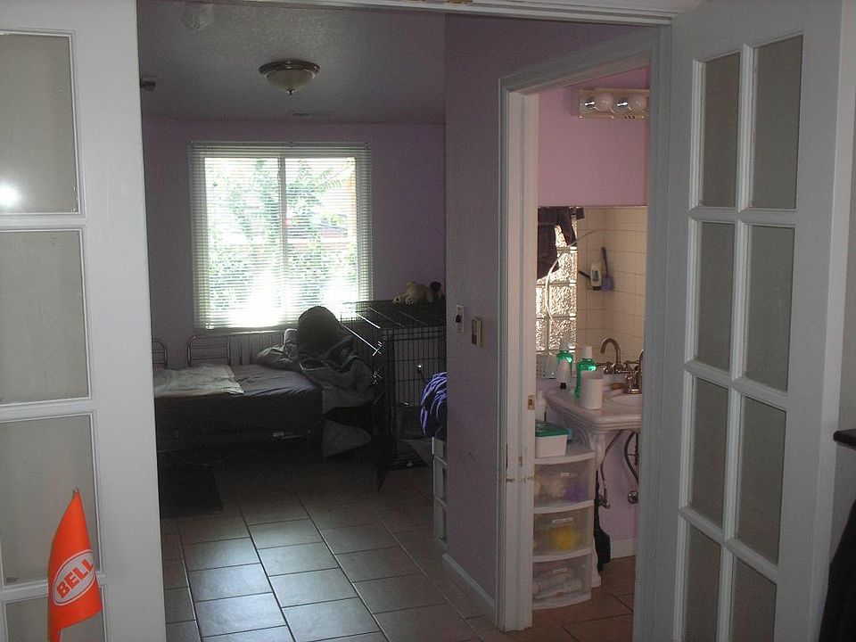 French doors to large bedroom and oversized shower.