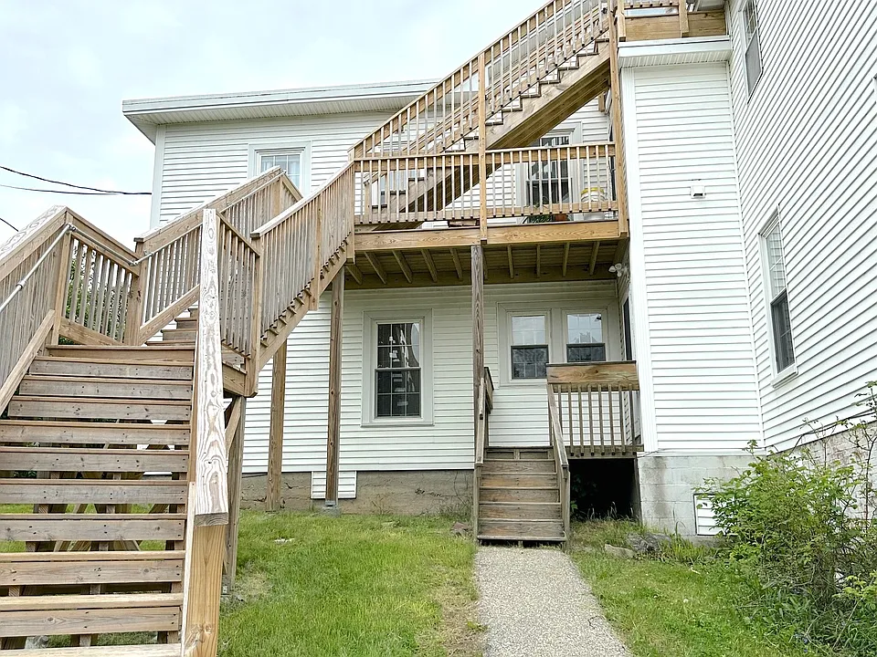 The unit is at the top of these stairs.