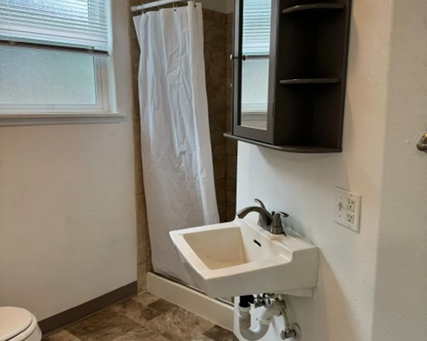 Bright & Updated Studio One-Level Living with Landscaping Included! — Photo 2