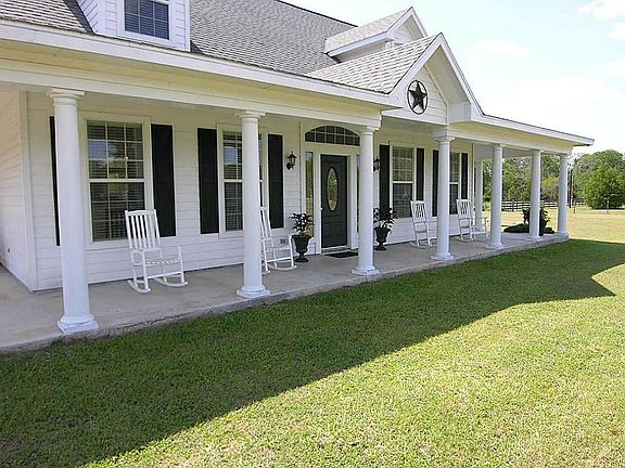 What could be better then sitting under this large covered porch