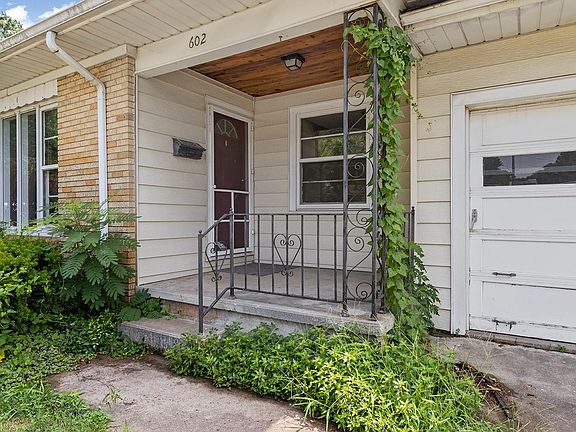 Covered Porch with Wood Ceiling. Tons of Character in this house