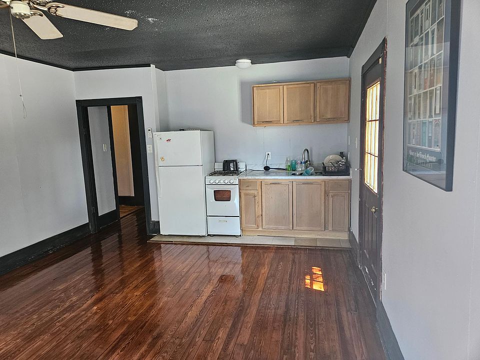 MAIN ROOM WITH KITHCHEN AREA VIEW