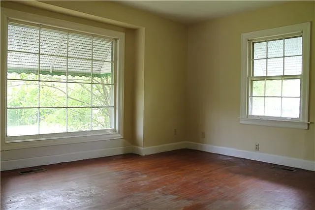 Older photo of Bay Window prior to floor refinishing in 2003