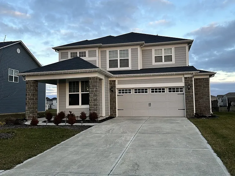 Front exterior view of the home, showcasing its welcoming curb appeal.
