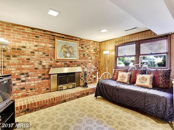Family Room with beautiful brick fireplace