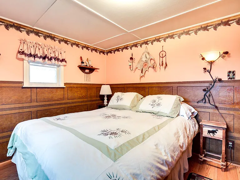 bedroom view one queen at Ian's Place Watersmeet Mi Vacation Rental. Lake front cottage rental Upper Peninsula