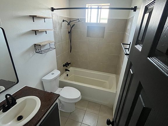 Front Bathroom. Tile shower, deep tub and all new fixtures