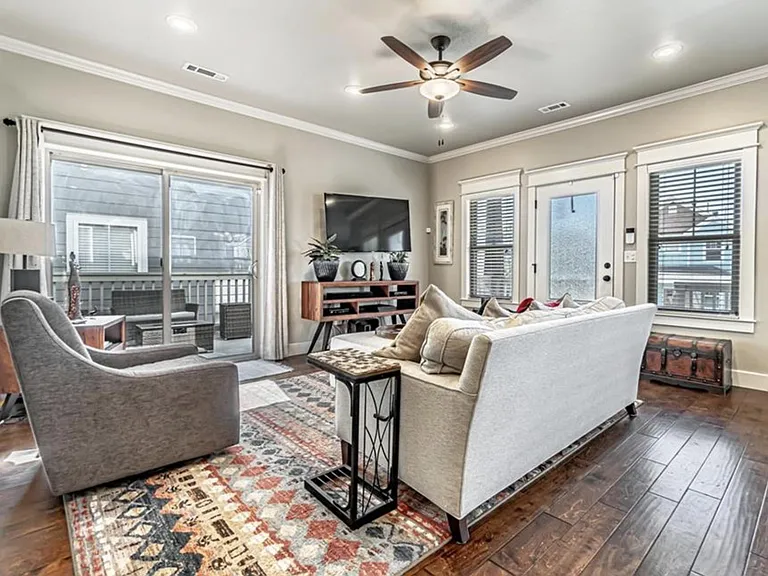 Sliding glass doors to deck next to living space