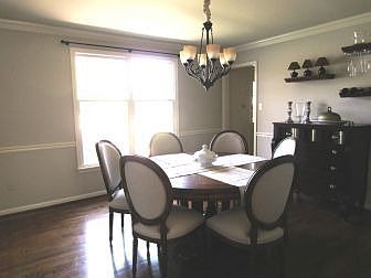 Chair rail and crown molding in dining room