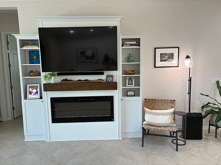Built in TV and fireplace