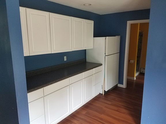 Extra storage by laundry area