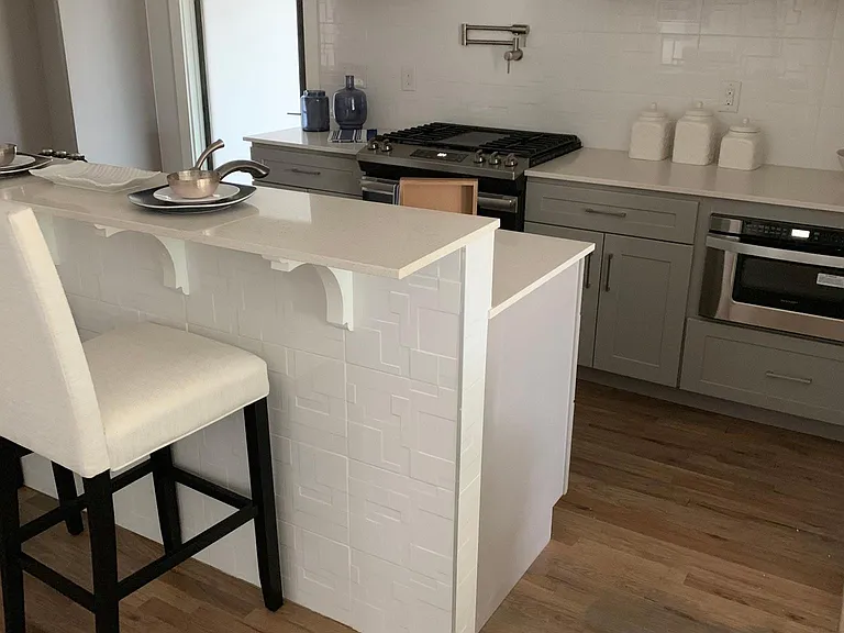 KITCHEN AREA WITH ACCESS TO LAUNDRY ROOM