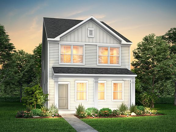 Norman Exterior 2 features siding, covered front sitting porch and 2 car rear load garage