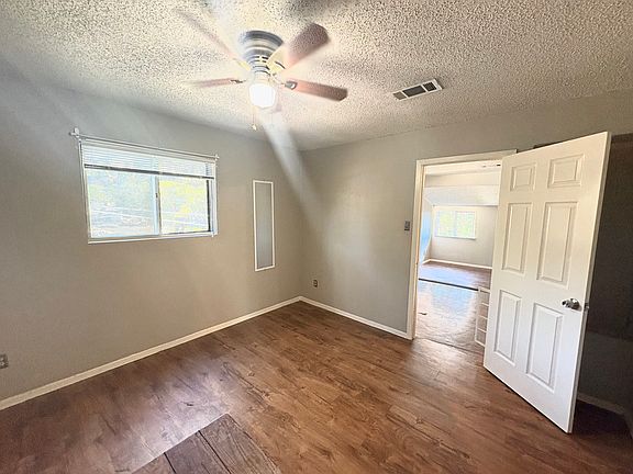 Bedroom corner unit w extra window.