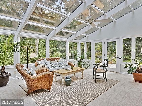 Stunning solarium with walls of glass