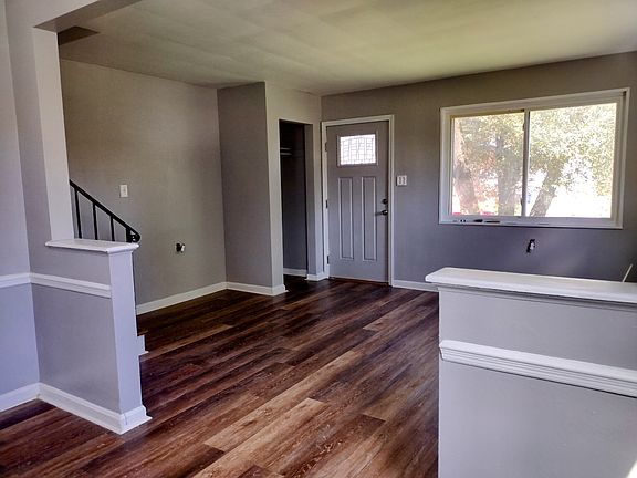 Living Room with hardwood type flooring & large picture window