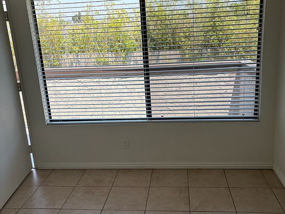 Dining area looking out to private patio.