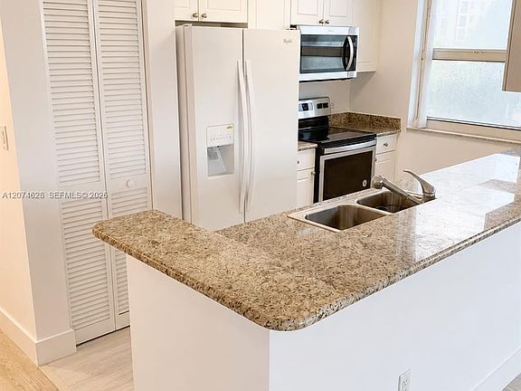 4th image of 19501 W Country Club Dr APT 408