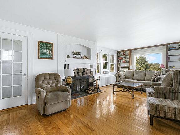 Living room with front door entry