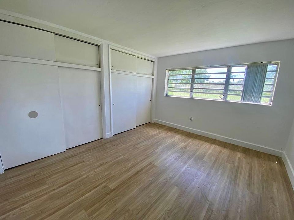 Master bedroom with one closet, plus walking closet and view to the garden