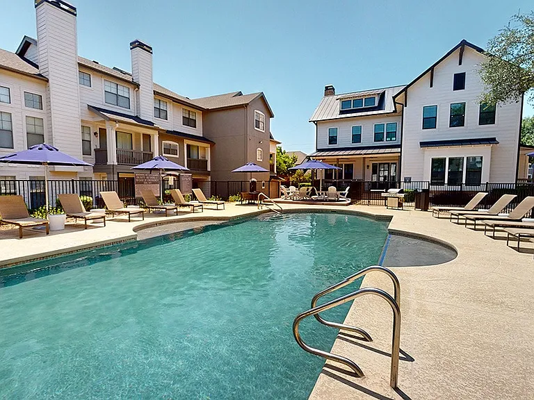 Our resort-style pool includes a sundeck with lounge seating