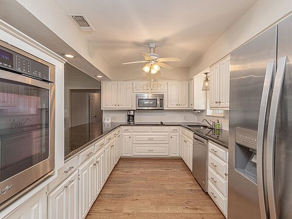 5th image of 542 Arrowwood Beach Cir