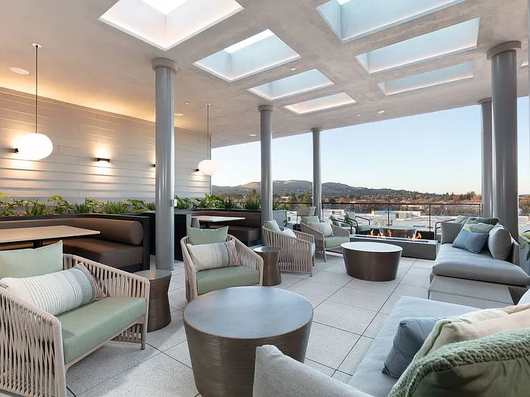 5th Floor Sky Deck with lounge seating, fire pit, and views