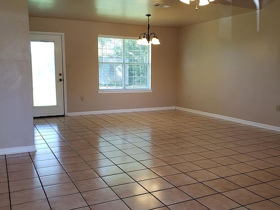 View from front door into living room and dining room.