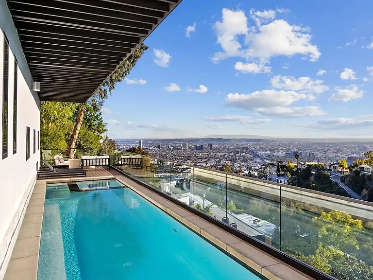Sip champagne as you soak in panoramic views from your private infinity pool.