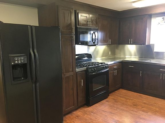 Stainless countertops, backsplash and sink