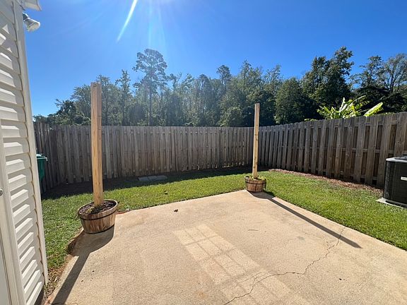 Fenced in Patio, comes with canopy to serve as shade