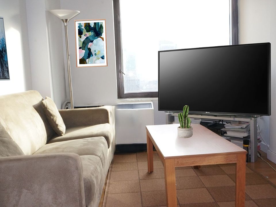 1st image of 100 W 39th St APT 42J