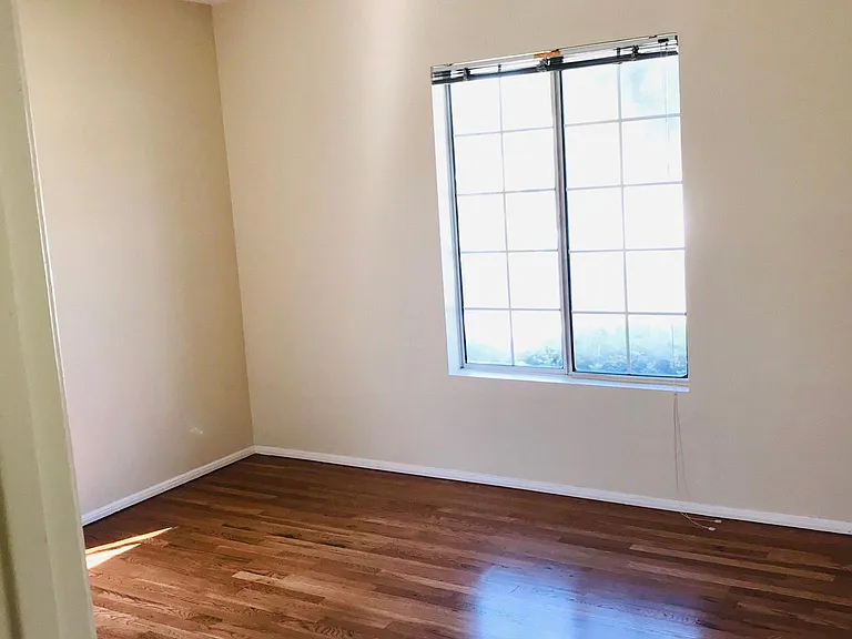 front bedroom with updated windows and smoothed ceilings