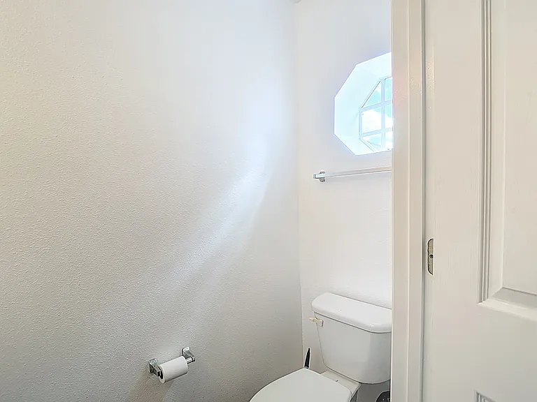 Shared downstairs half bath.