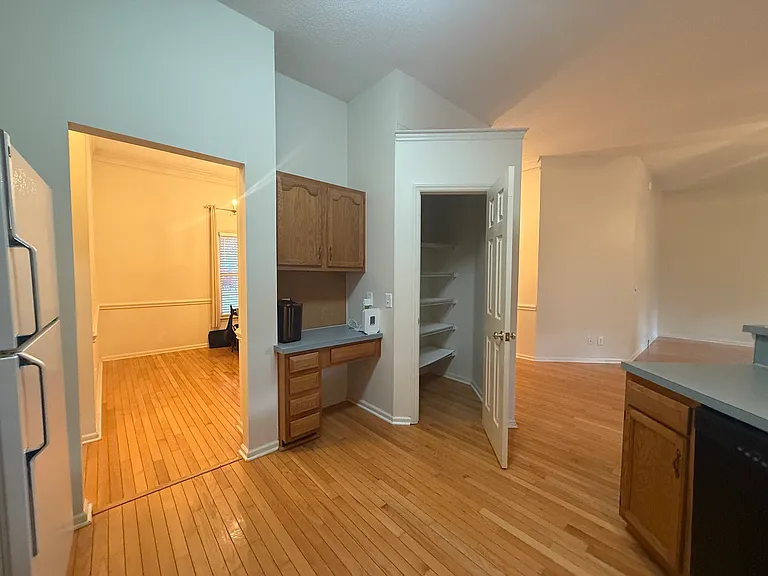 View from kitchen with open pantry door